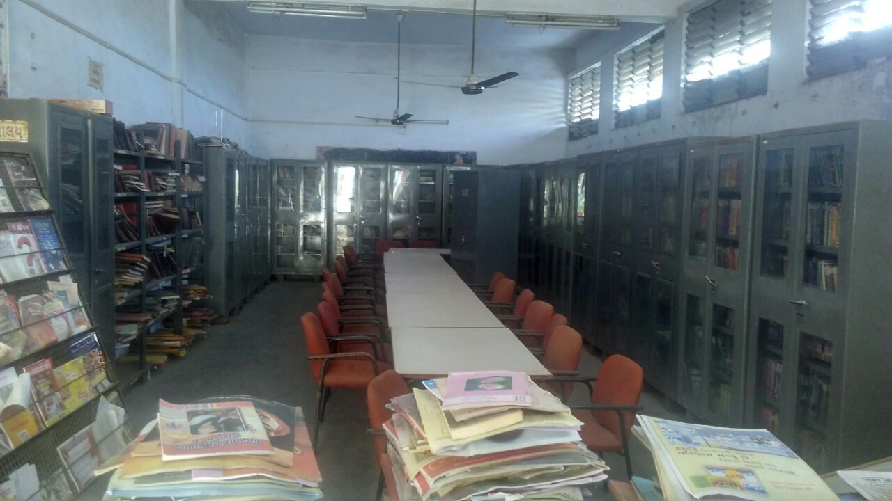 College library with reading tables and books